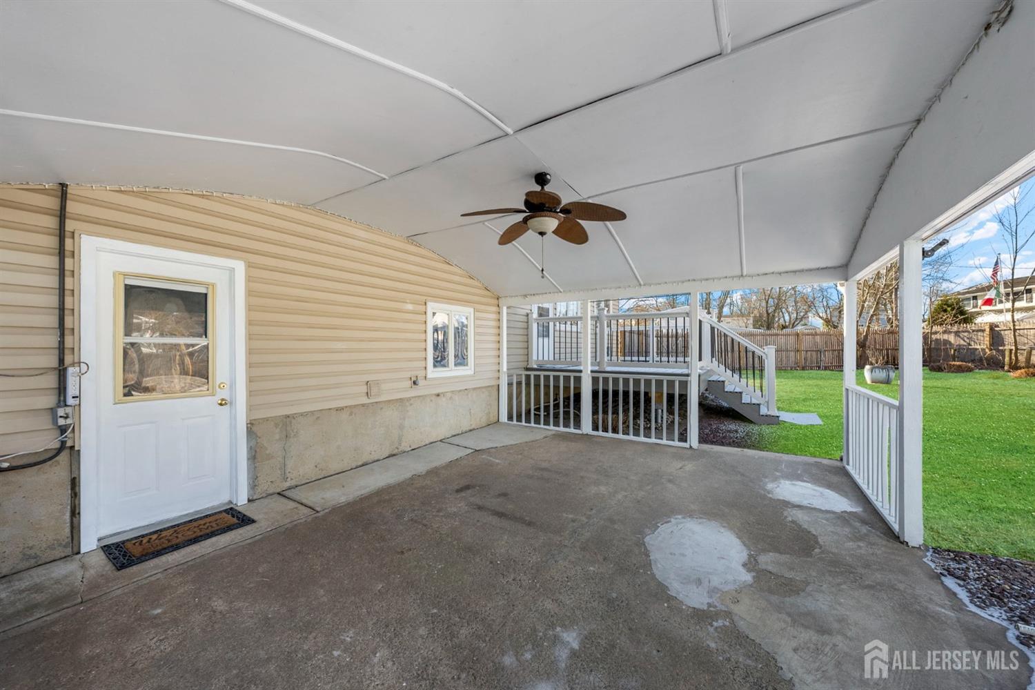 9 Piedmont Drive Old Bridge, NJ 08857 - Photo 34 of 40 a view of a porch with furniture and floor to ceiling window