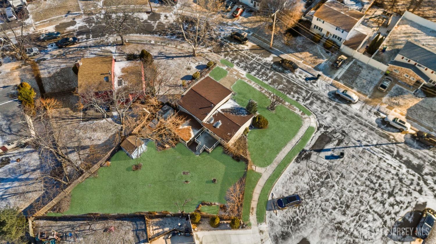 9 Piedmont Drive Old Bridge, NJ 08857 - Photo 4 of 40 an aerial view of a residential houses with outdoor space