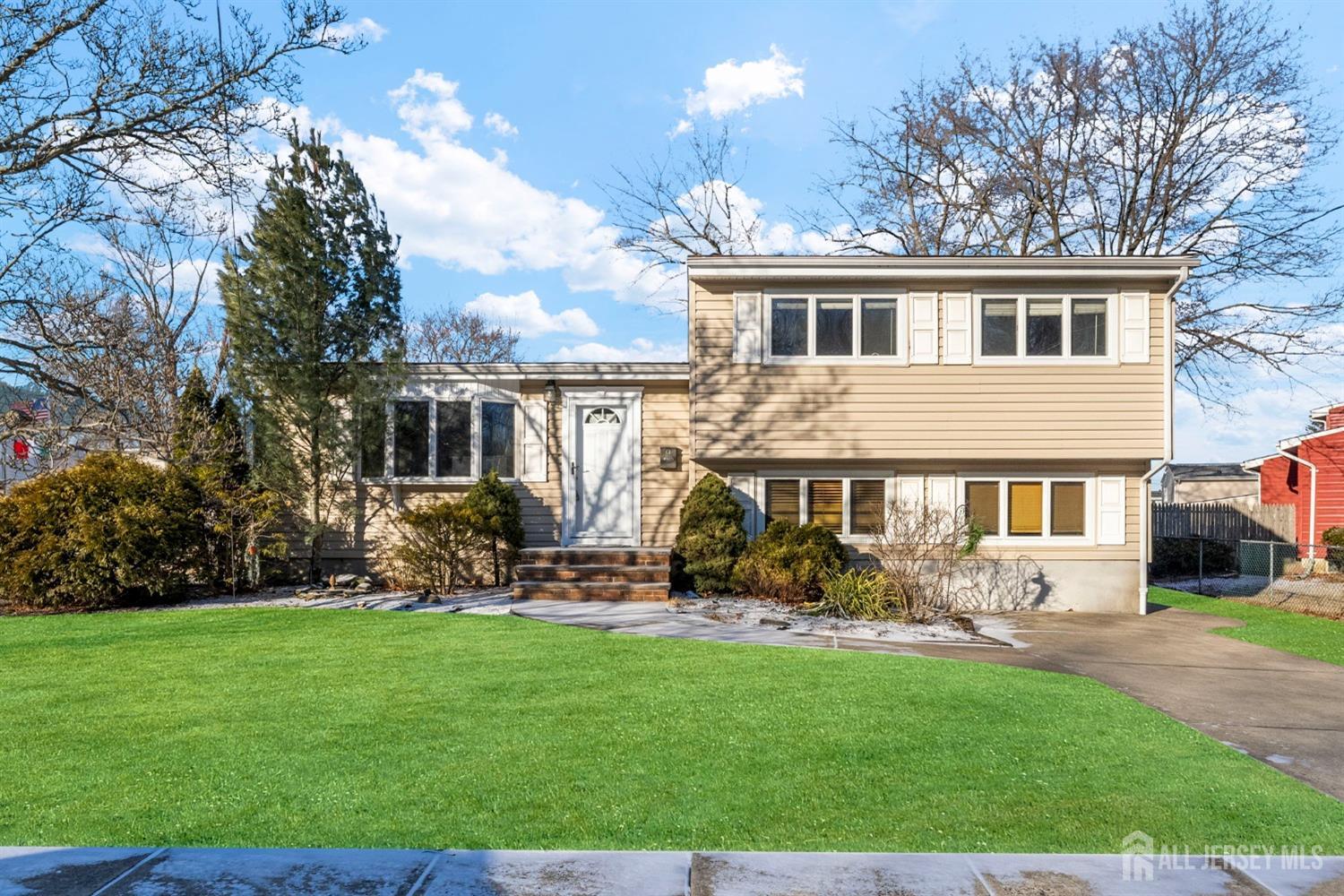 9 Piedmont Drive Old Bridge, NJ 08857 - Photo 6 of 40 a front view of house with yard and green space