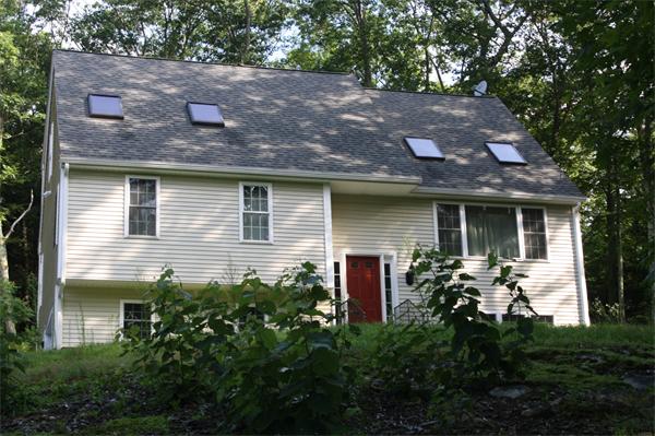 426 Walnut Hill Road Orange, MA 01364 - Photo 1 of 12 a front view of a house with garden