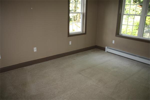 426 Walnut Hill Road Orange, MA 01364 - Photo 7 of 12 an empty room with windows