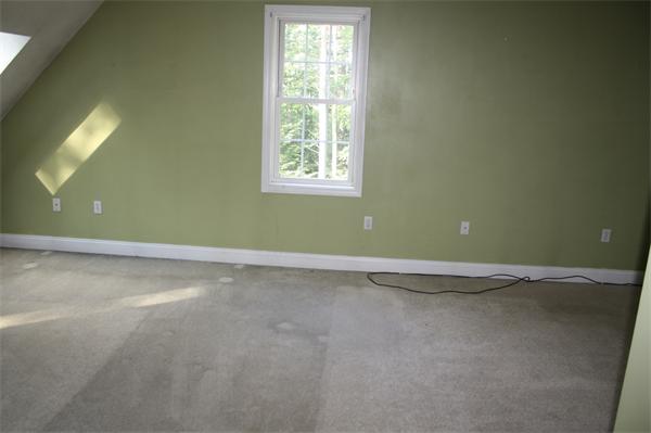 426 Walnut Hill Road Orange, MA 01364 - Photo 8 of 12 an empty room with a window