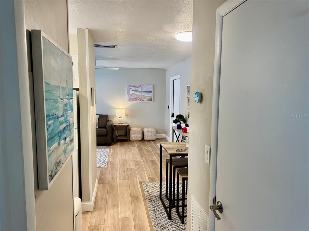 10 164th Avenue, Unit 11 Redington Beach, FL 33708 - Photo 18 of 30 a view of a hallway with interior of the house