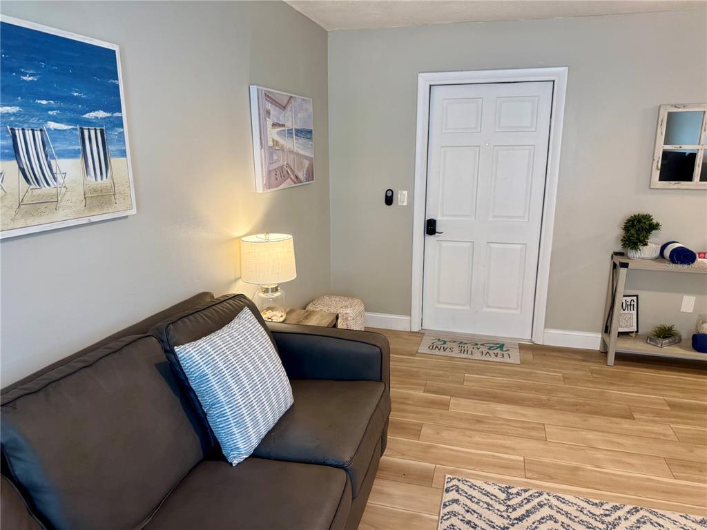 10 164th Avenue, Unit 11 Redington Beach, FL 33708 - Photo 8 of 30 a bedroom with furniture and a window