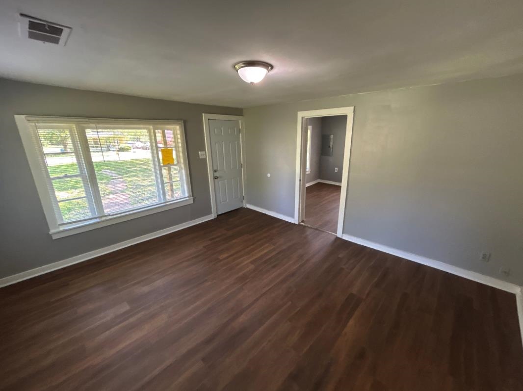 3447 Cook Road Memphis, TN 38109 - Photo 5 of 7 Foyer entrance featuring baseboards and dark wood finished floors