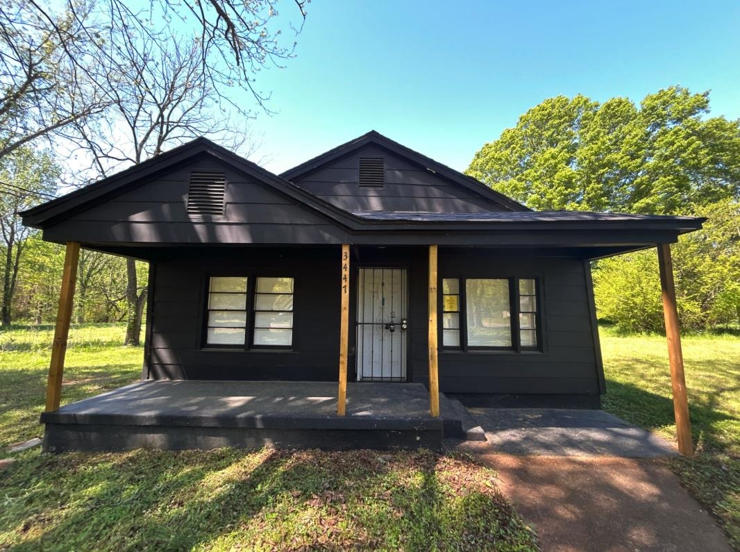 3447 Cook Road Memphis, TN 38109 - Photo 7 of 7 Bungalow-style home with a front lawn and covered porch