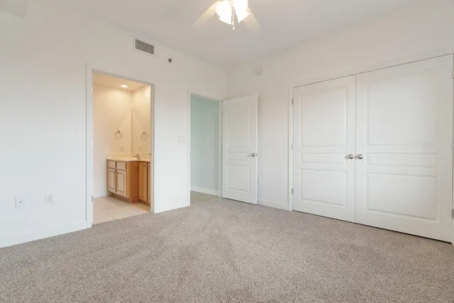 a bathroom with a glass shower door