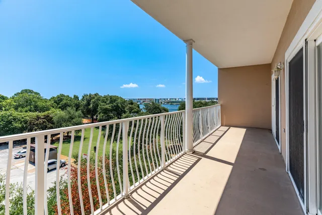 a view of a balcony with furniture and outdoor space