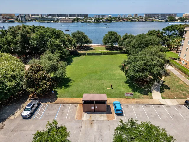a view of a yard with chairs