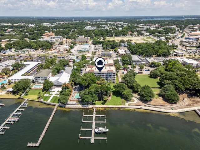 a large kitchen with a stove a sink dishwasher and a stove