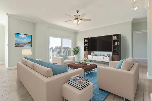 a view of an empty room and a chandelier fan