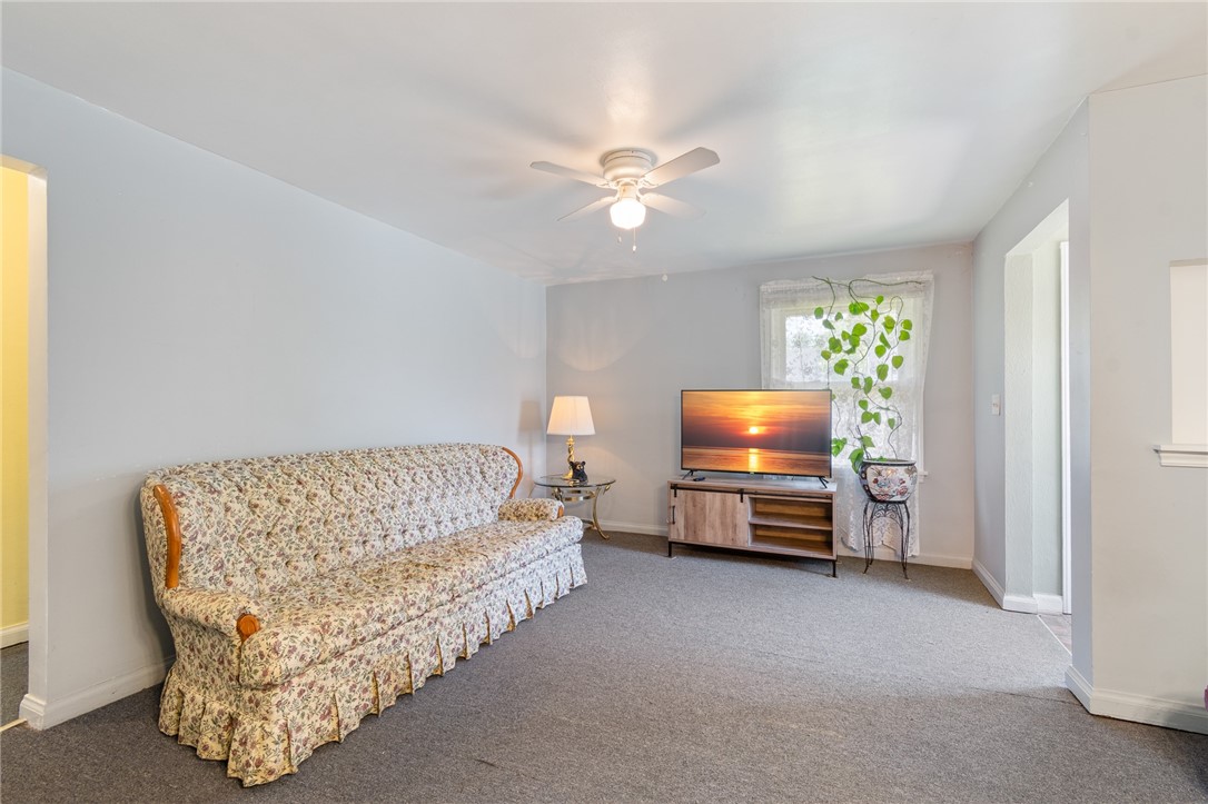 206 English Road Greece, NY 14616 - Photo 4 of 24 The living room space - opens to a dining area too