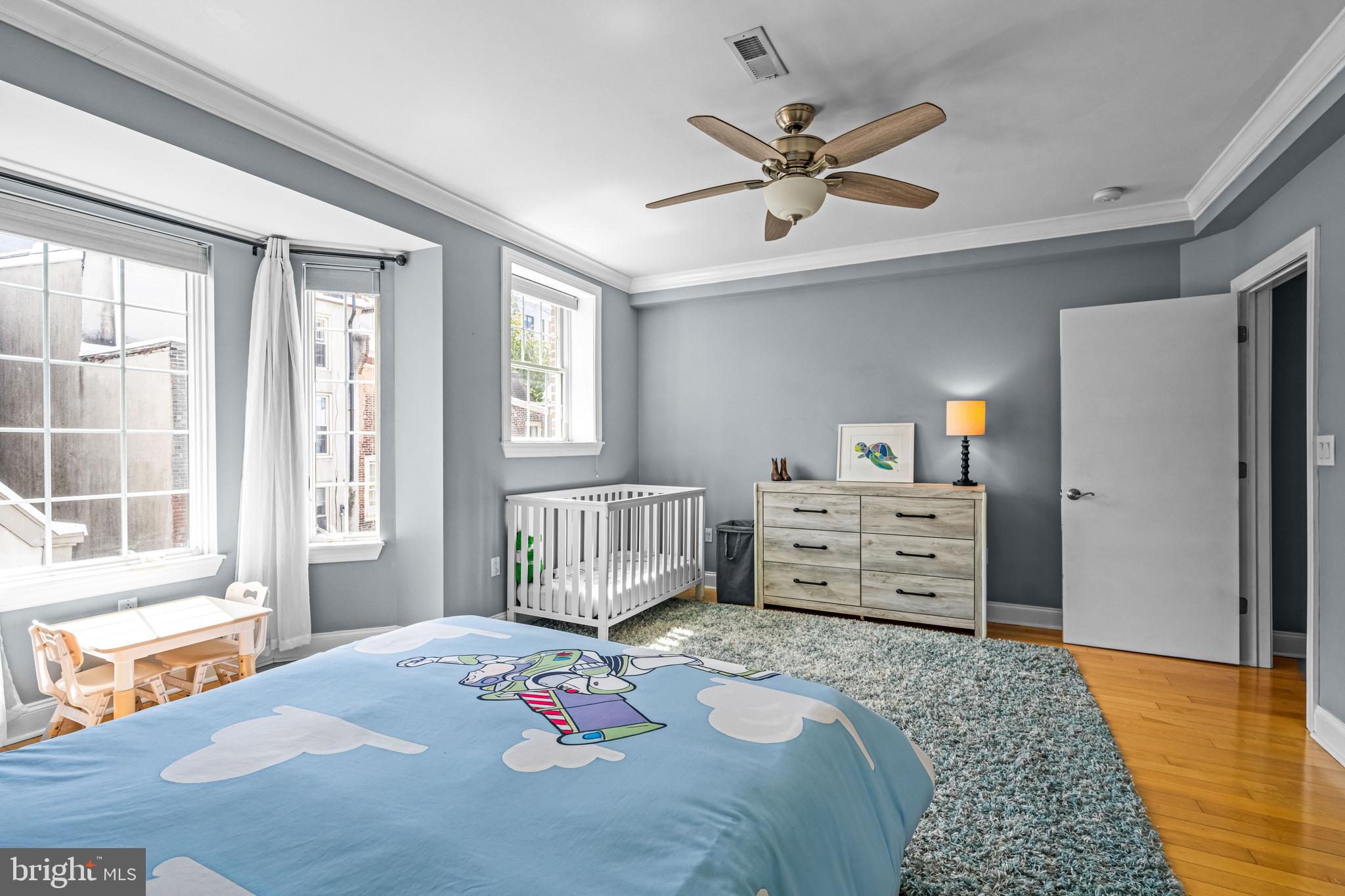 116 Quarry Street Philadelphia, PA 19106 - Photo 37 of 57 a bedroom that has a bed and a dresser in it