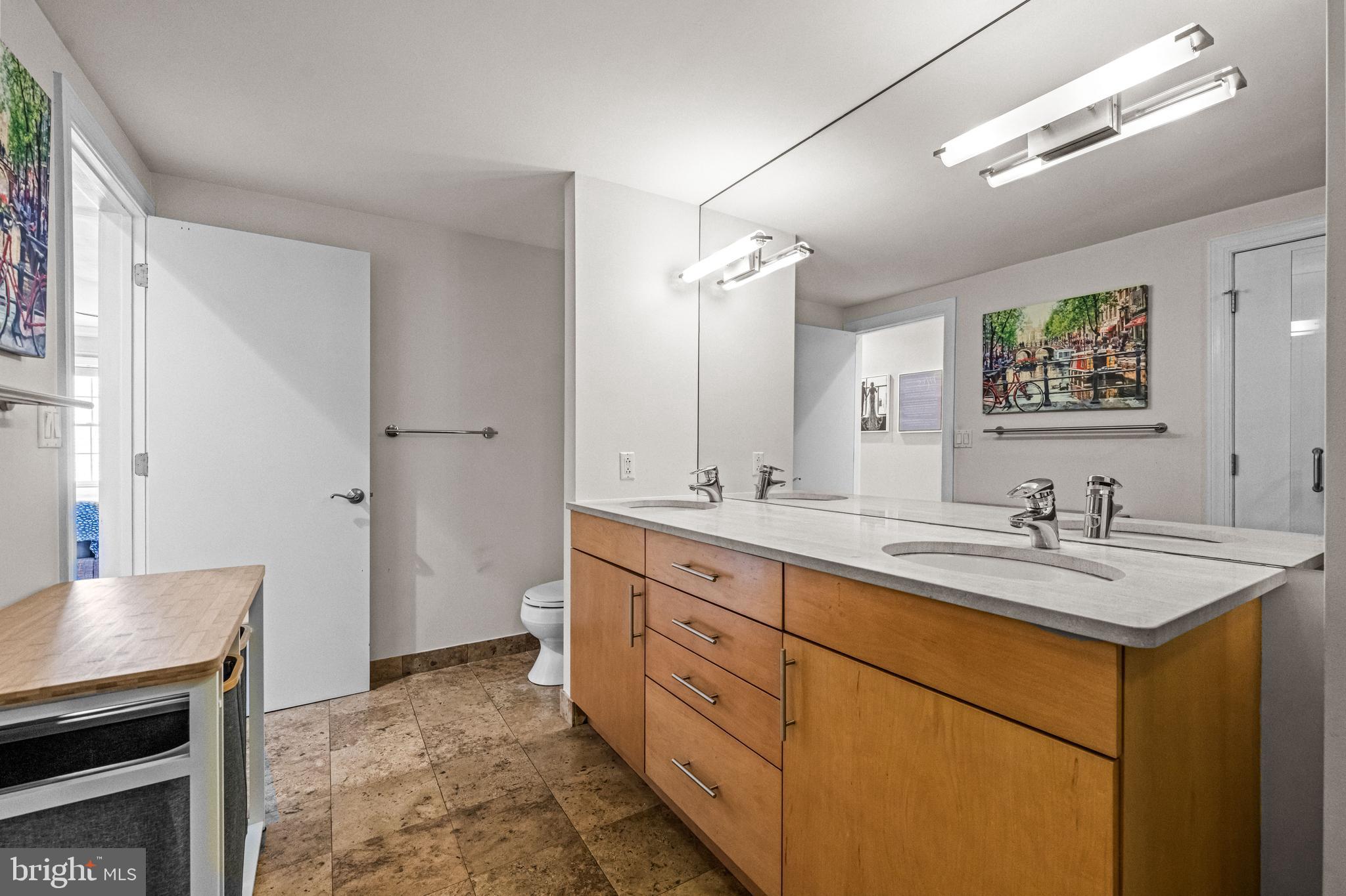 116 Quarry Street Philadelphia, PA 19106 - Photo 47 of 57 a spacious bathroom with a sink and a mirror