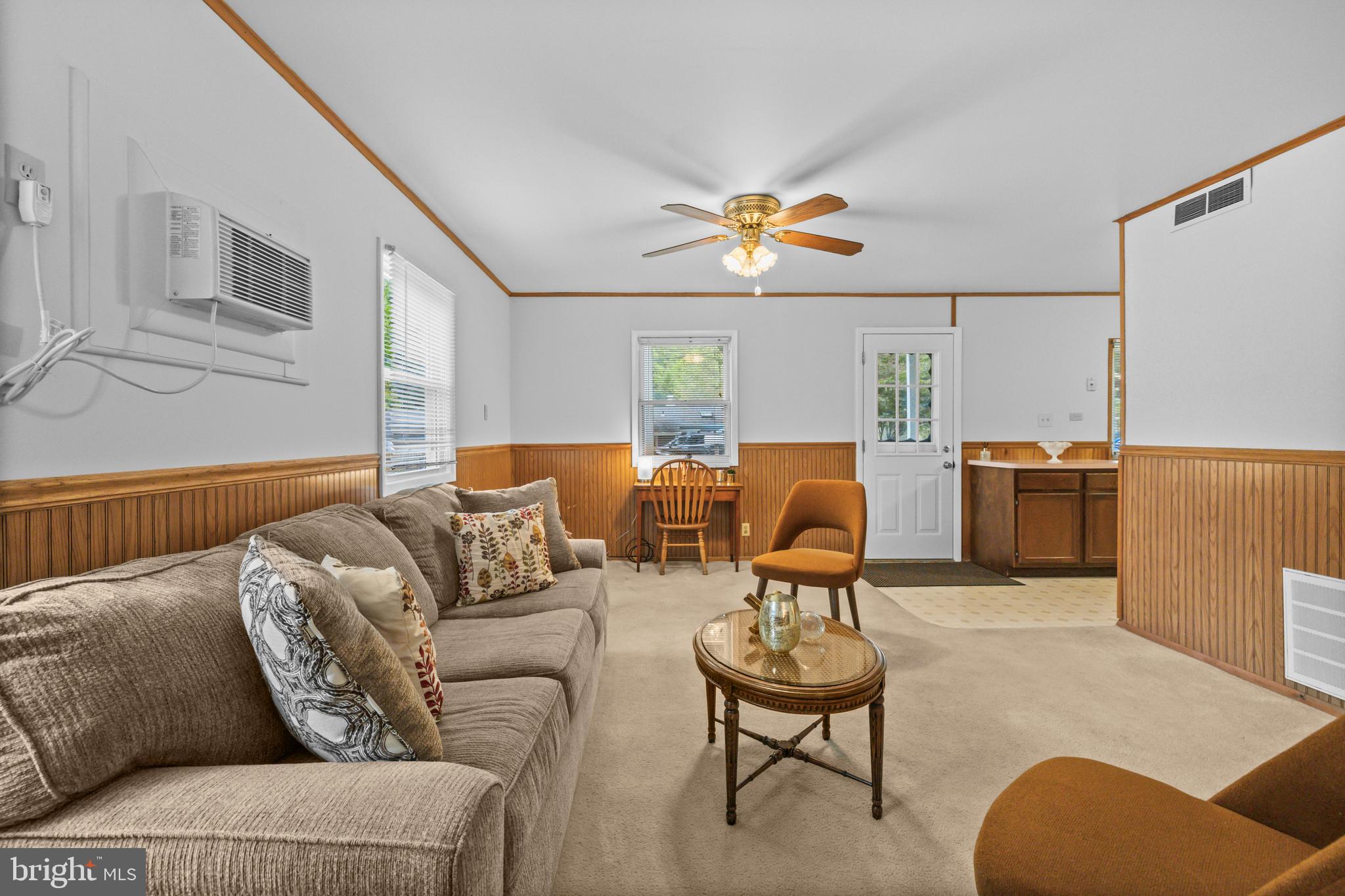 4 Russell Road Cabin John, MD 20818 - Photo 10 of 56 a living room with furniture kitchen view and a window