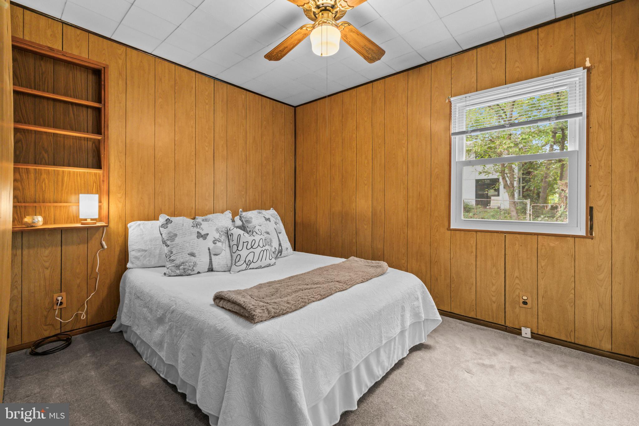 4 Russell Road Cabin John, MD 20818 - Photo 20 of 56 a bedroom with a bed and a window