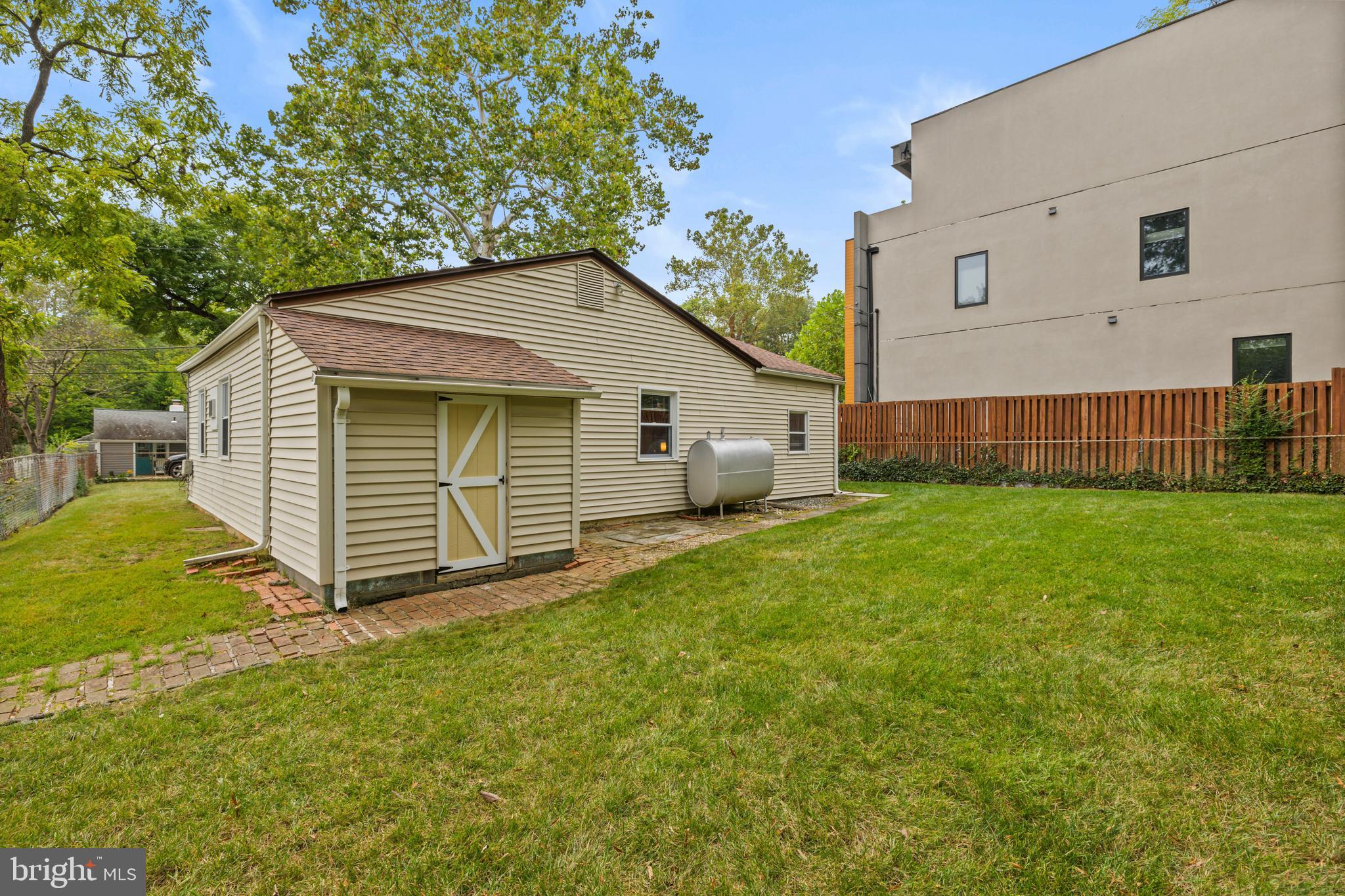 4 Russell Road Cabin John, MD 20818 - Photo 30 of 56 a view of a house with a yard