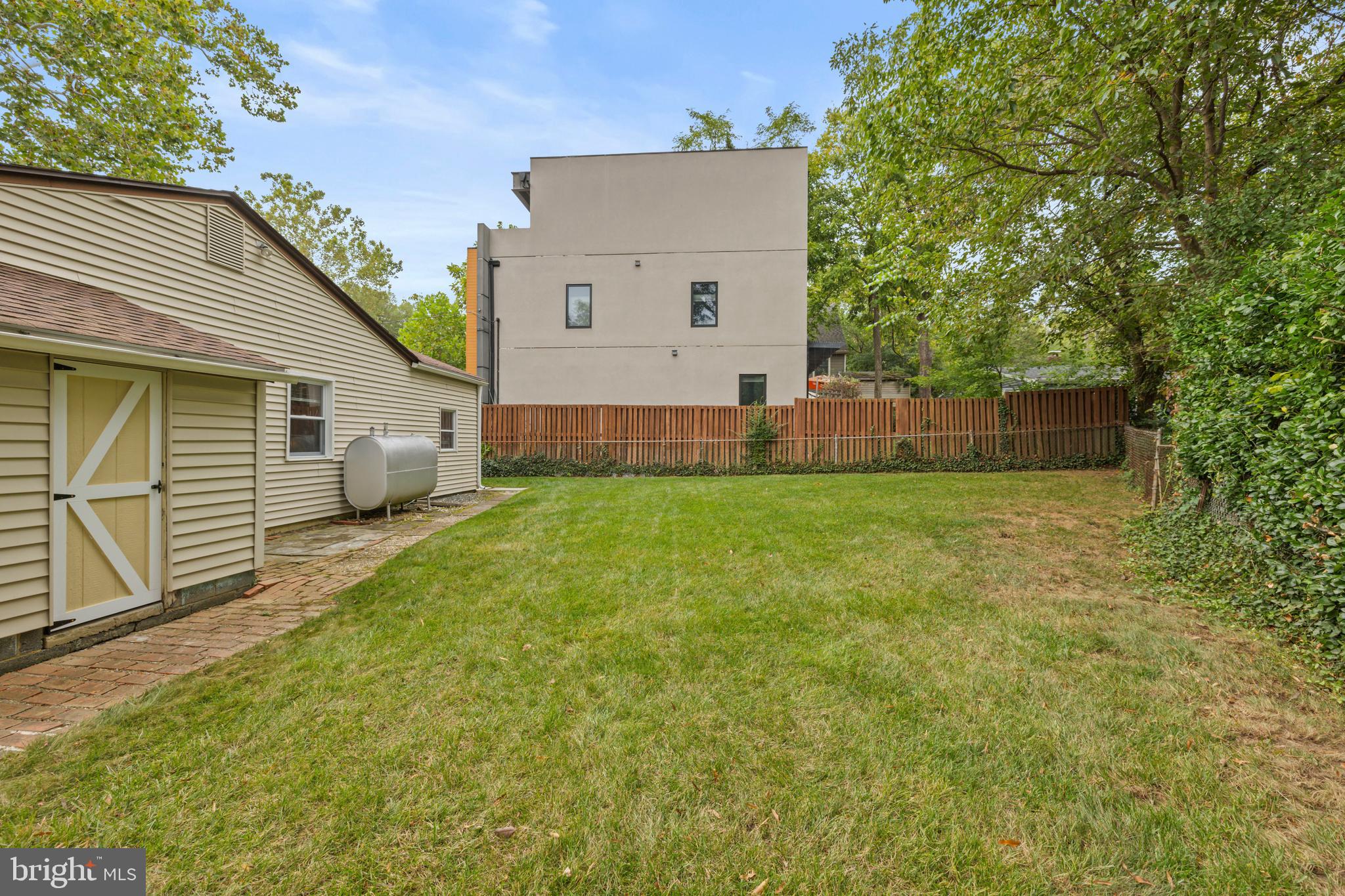4 Russell Road Cabin John, MD 20818 - Photo 31 of 56 a view of a backyard with a garden