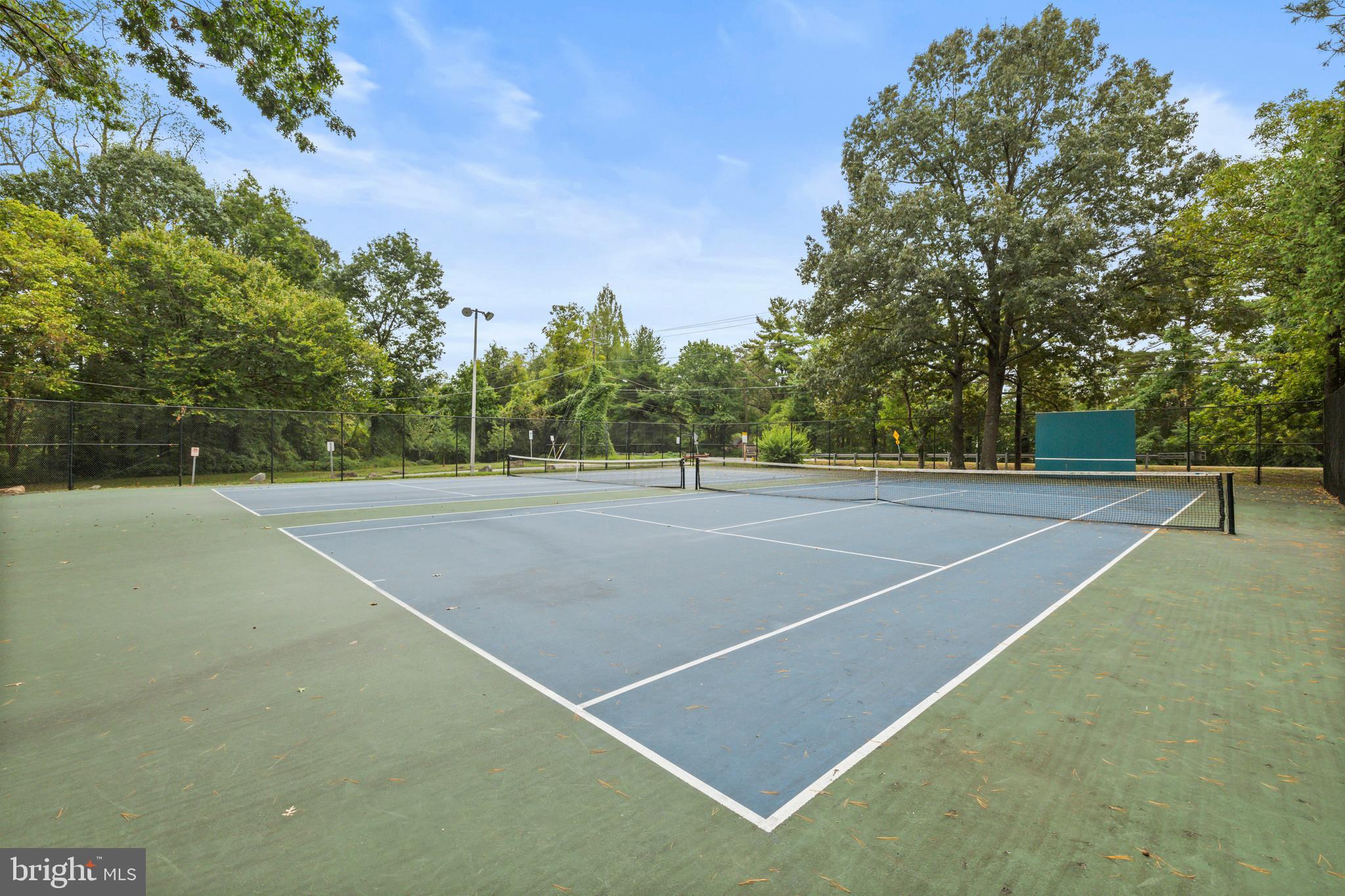 4 Russell Road Cabin John, MD 20818 - Photo 44 of 56 a view of a tennis court