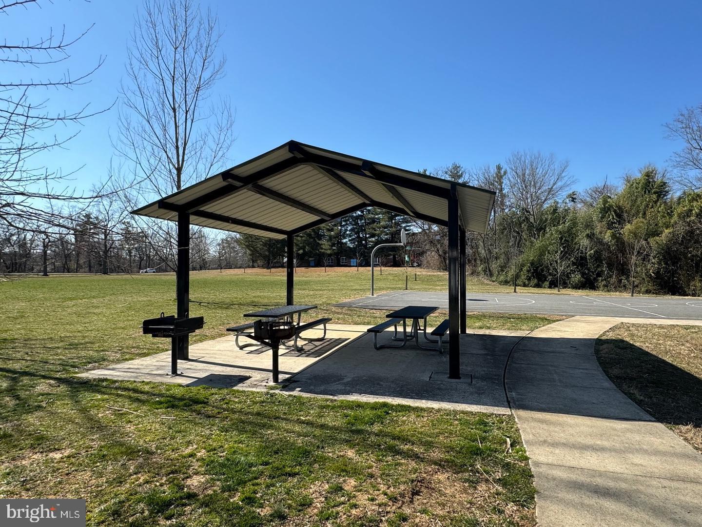 4 Russell Road Cabin John, MD 20818 - Photo 47 of 56 a bench sitting in the middle of a house