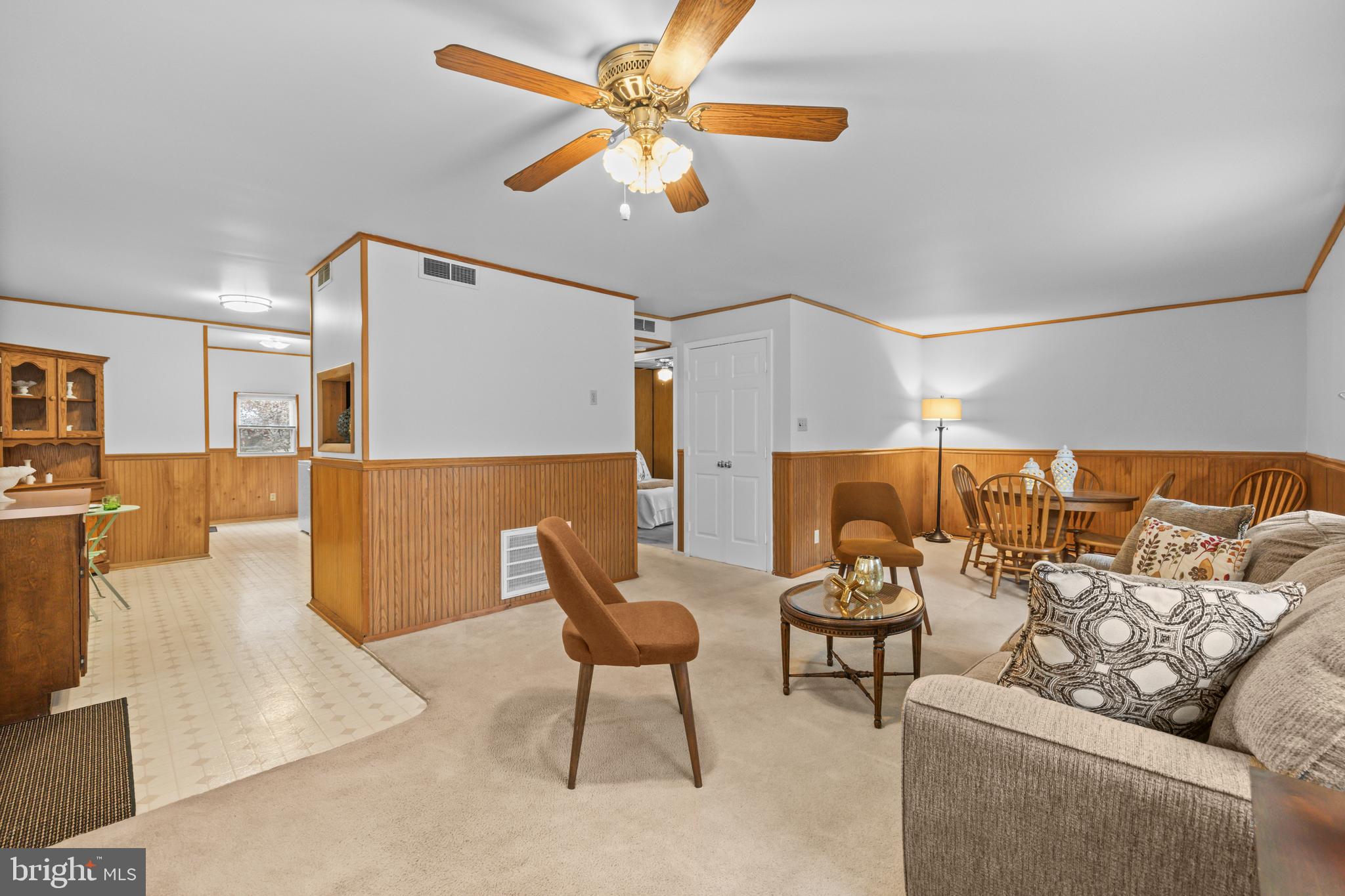 4 Russell Road Cabin John, MD 20818 - Photo 5 of 56 a living room with furniture and a ceiling fan