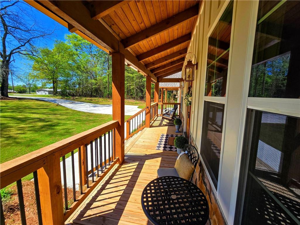 136 Rainey Road Temple, GA 30179 - Photo 13 of 75 a view of balcony with wooden floor