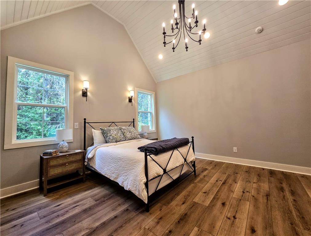 136 Rainey Road Temple, GA 30179 - Photo 35 of 75 a bedroom with a bed and a window