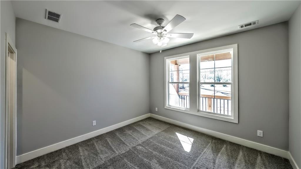 136 Rainey Road Temple, GA 30179 - Photo 50 of 75 a view of an empty room with a window
