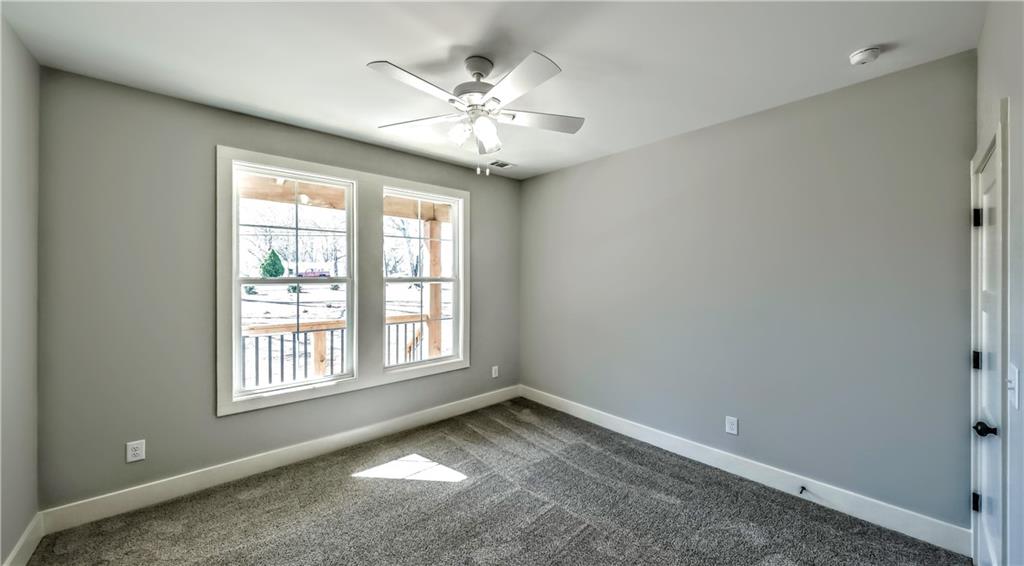 136 Rainey Road Temple, GA 30179 - Photo 51 of 75 a view of an empty room with a window
