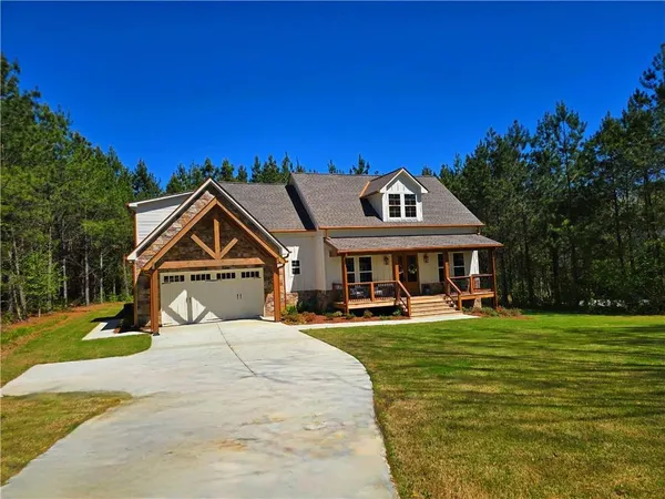 a view of balcony with wooden floor
