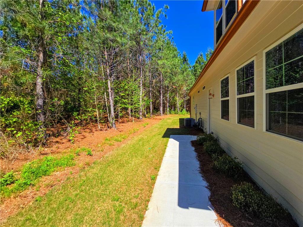 136 Rainey Road Temple, GA 30179 - Photo 61 of 75 a view of a pathway with a yard