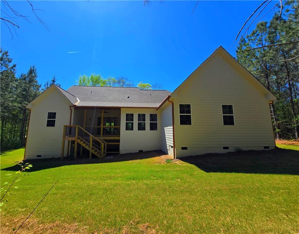 136 Rainey Road Temple, GA 30179 - Photo 65 of 75 a view of a house with backyard and sitting area