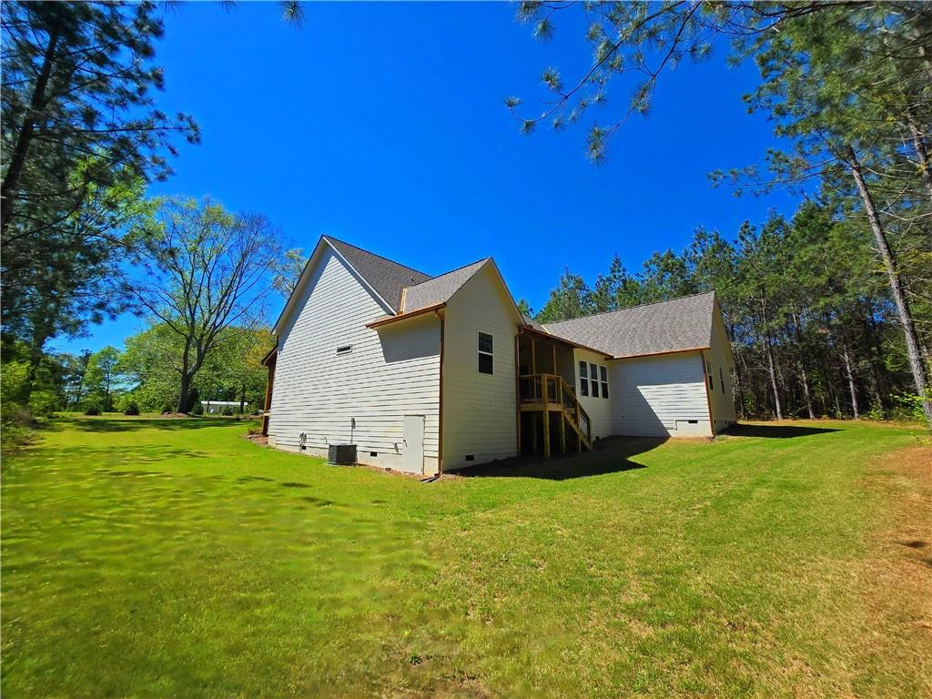 136 Rainey Road Temple, GA 30179 - Photo 67 of 75 a view of a house with yard and a tree