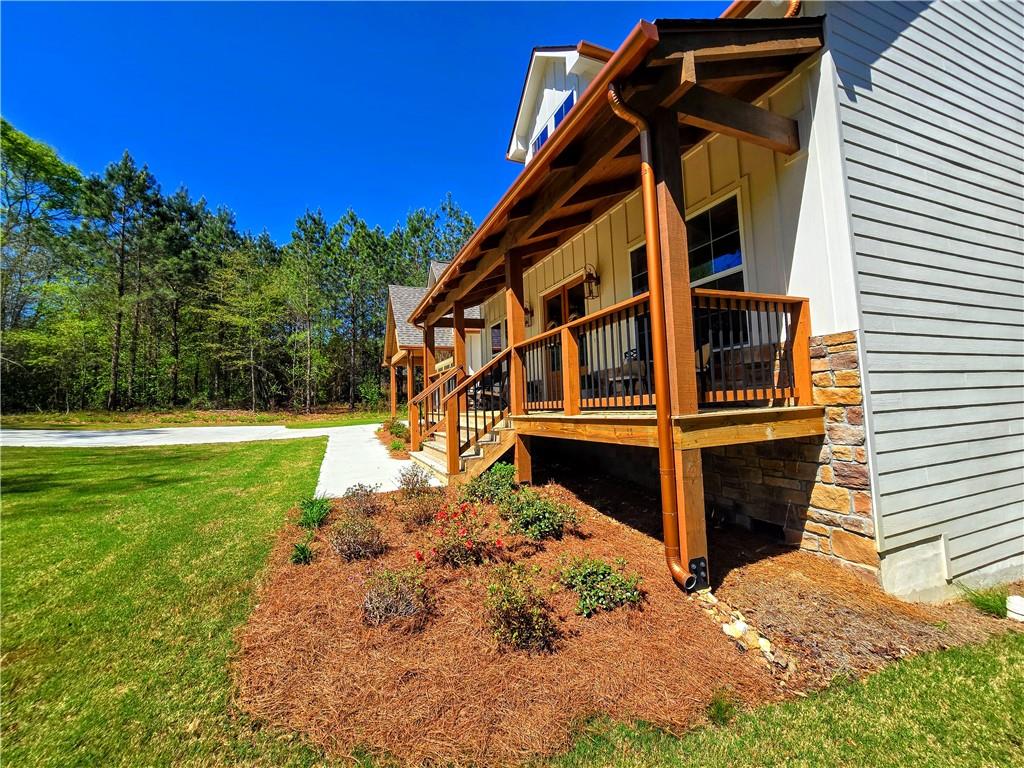 136 Rainey Road Temple, GA 30179 - Photo 68 of 75 a view of a house with a yard