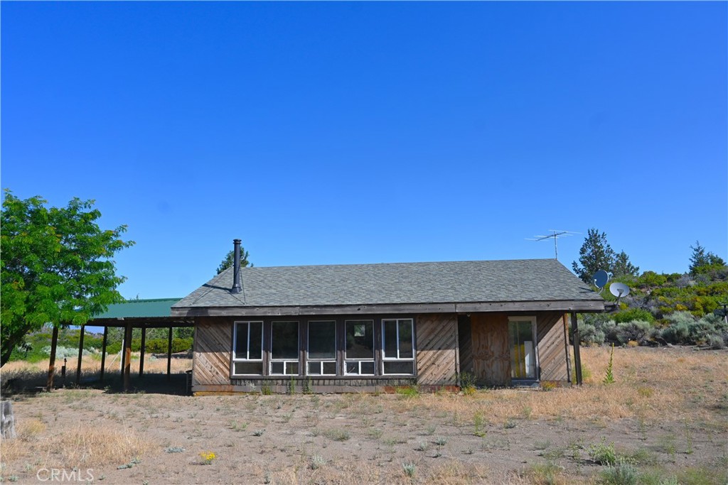 7021 Quarry Road Weed, CA 96094 - Photo 20 of 37 a front view of a house with garden