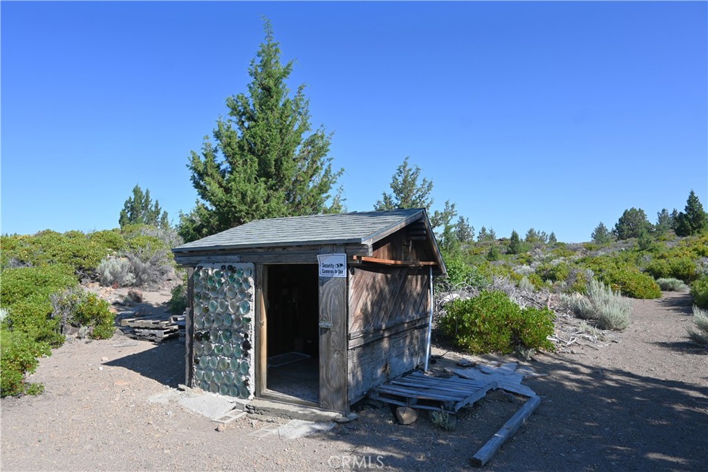 7021 Quarry Road Weed, CA 96094 - Photo 21 of 37 a front view of a house with a yard