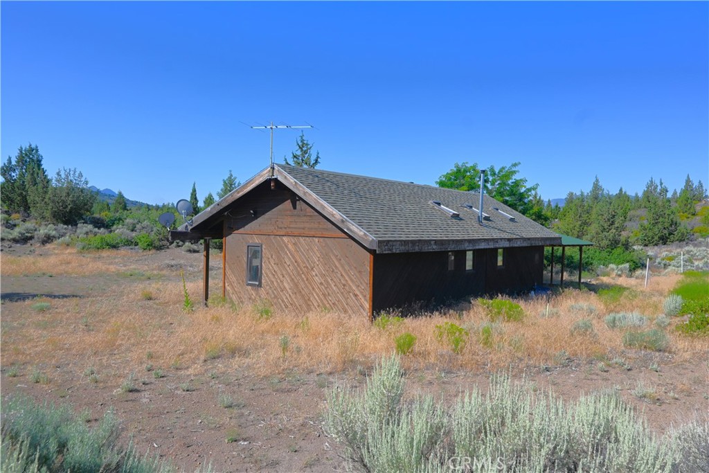 7021 Quarry Road Weed, CA 96094 - Photo 24 of 37 a house view with a lake view