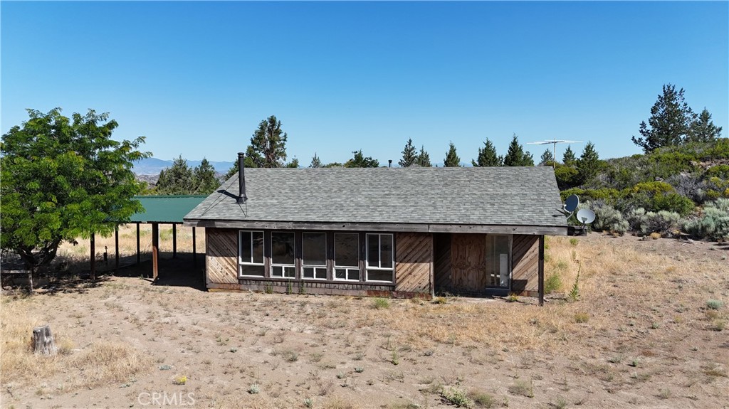 7021 Quarry Road Weed, CA 96094 - Photo 25 of 37 a front view of a house with a yard