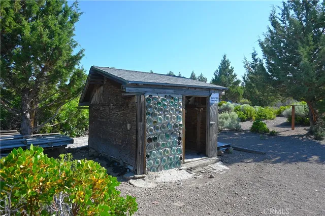 a view of a room with wooden walls