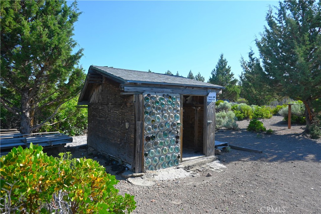 7021 Quarry Road Weed, CA 96094 - Photo 26 of 37 a front view of a house with garden