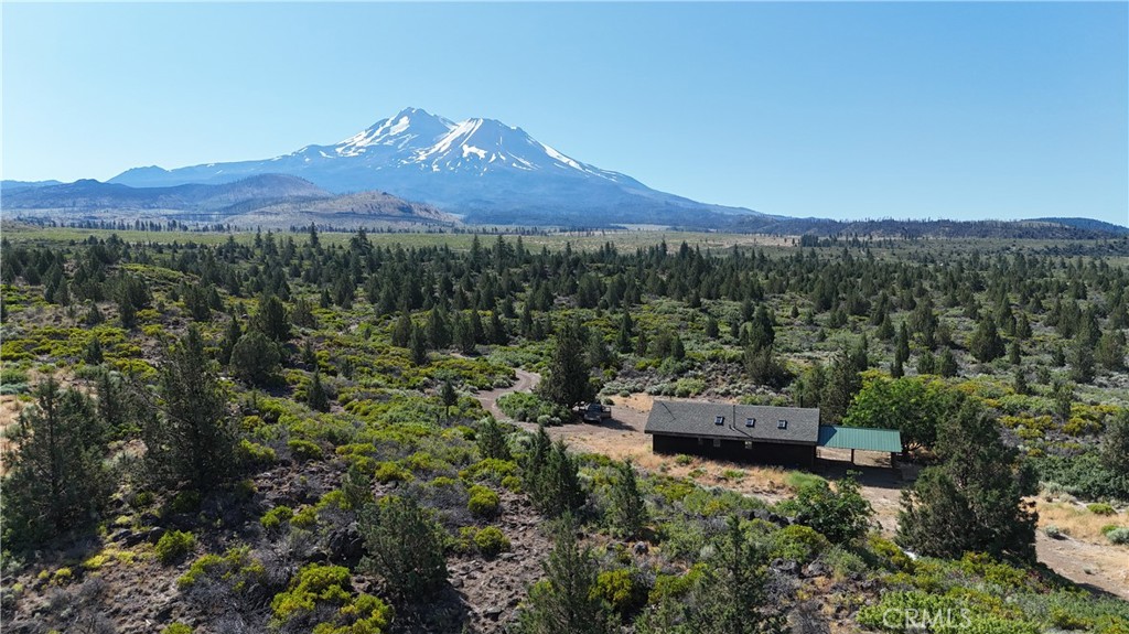 7021 Quarry Road Weed, CA 96094 - Photo 29 of 37 a view of a house with a yard