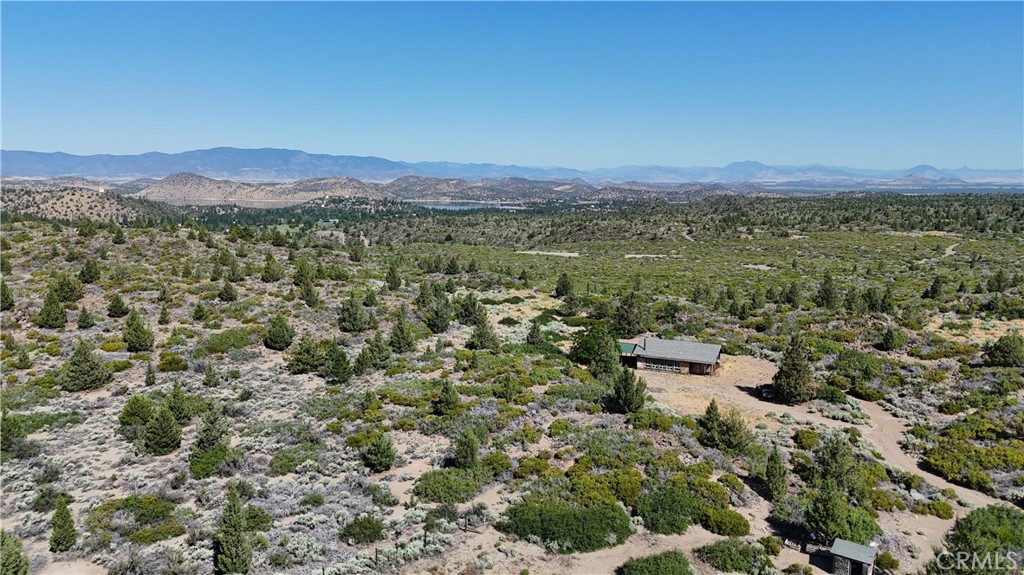 7021 Quarry Road Weed, CA 96094 - Photo 32 of 37 a view of a lush green field with mountains in the background