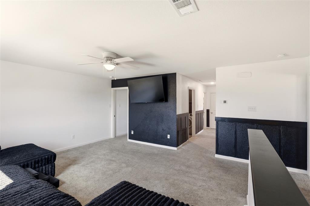 791 Devonshire Drive Lavon, TX 75166 - Photo 20 of 32 a view of a hallway with a ceiling fan