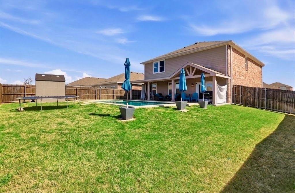 791 Devonshire Drive Lavon, TX 75166 - Photo 2 of 32 a front view of a house with a yard