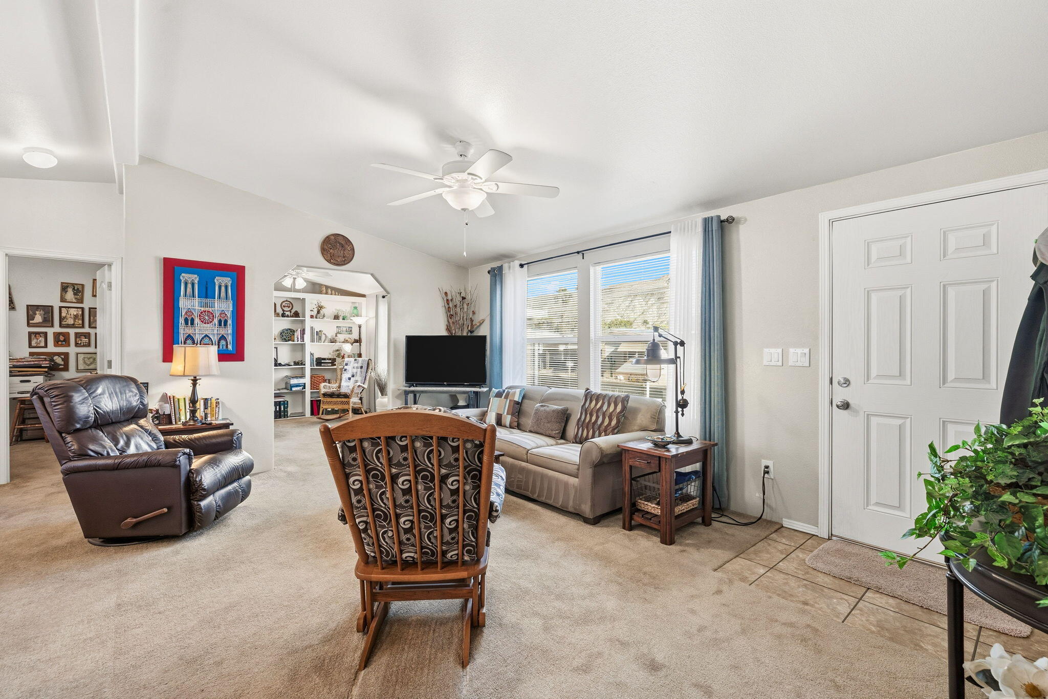 74711 Dillon Road, Unit 312 Desert Hot Springs, CA 92241 - Photo 13 of 49 a living room with furniture and a flat screen tv