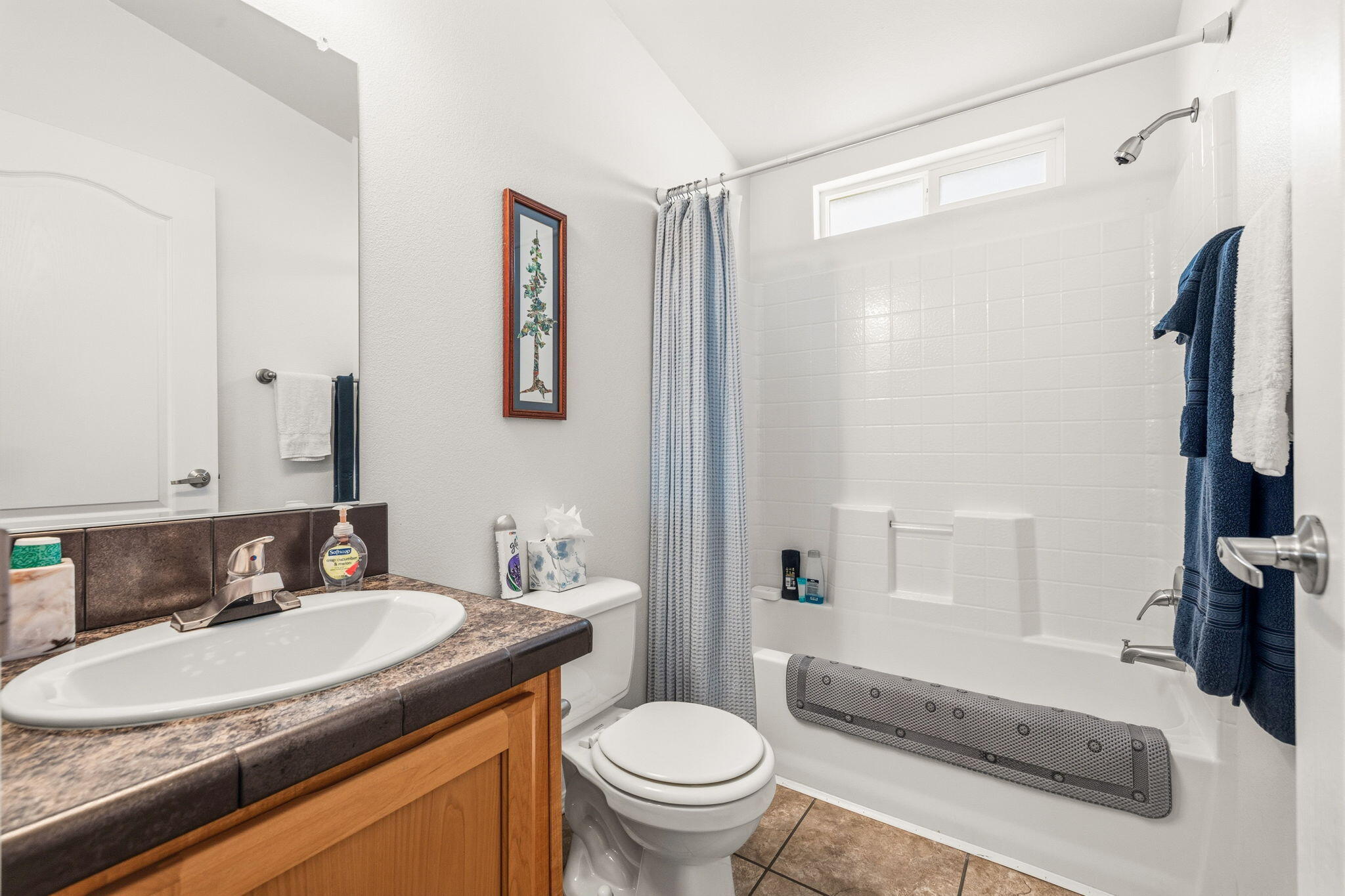 74711 Dillon Road, Unit 312 Desert Hot Springs, CA 92241 - Photo 24 of 49 a bathroom with a granite countertop sink toilet and a mirror