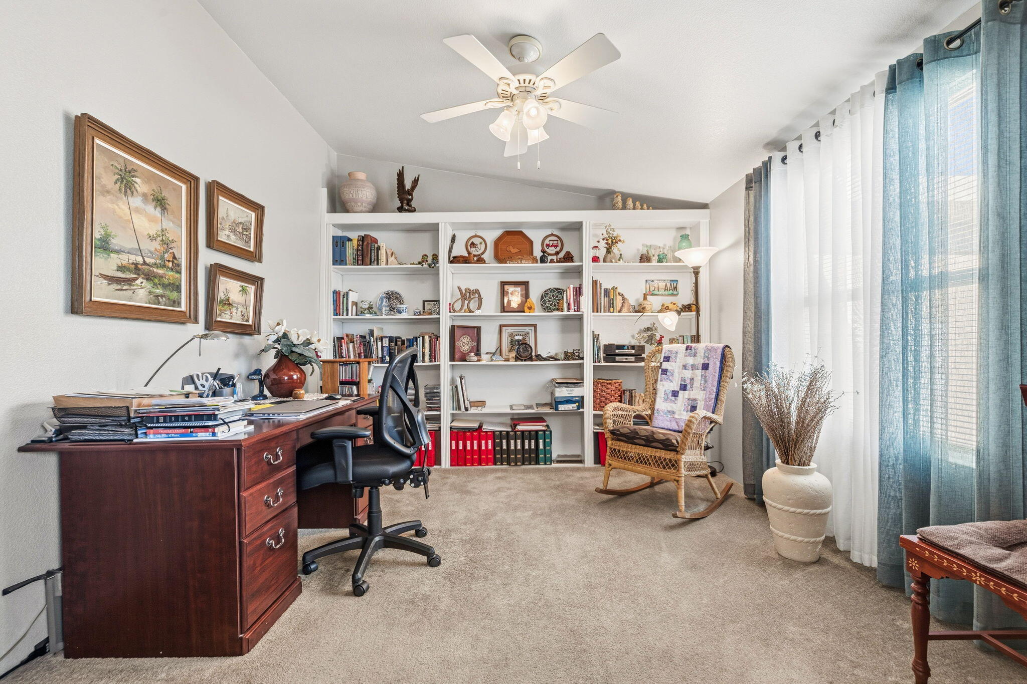 74711 Dillon Road, Unit 312 Desert Hot Springs, CA 92241 - Photo 31 of 49 a view of a workspace with furniture and a window