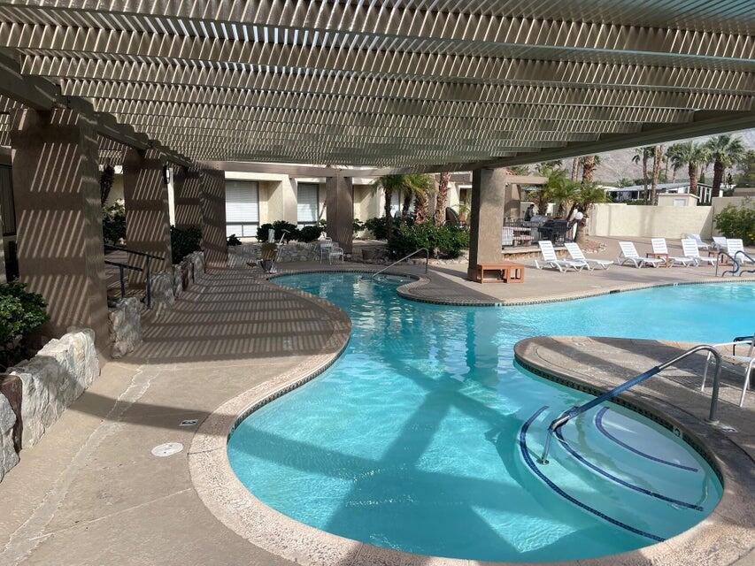 74711 Dillon Road, Unit 312 Desert Hot Springs, CA 92241 - Photo 43 of 49 a view of a living room and kitchen