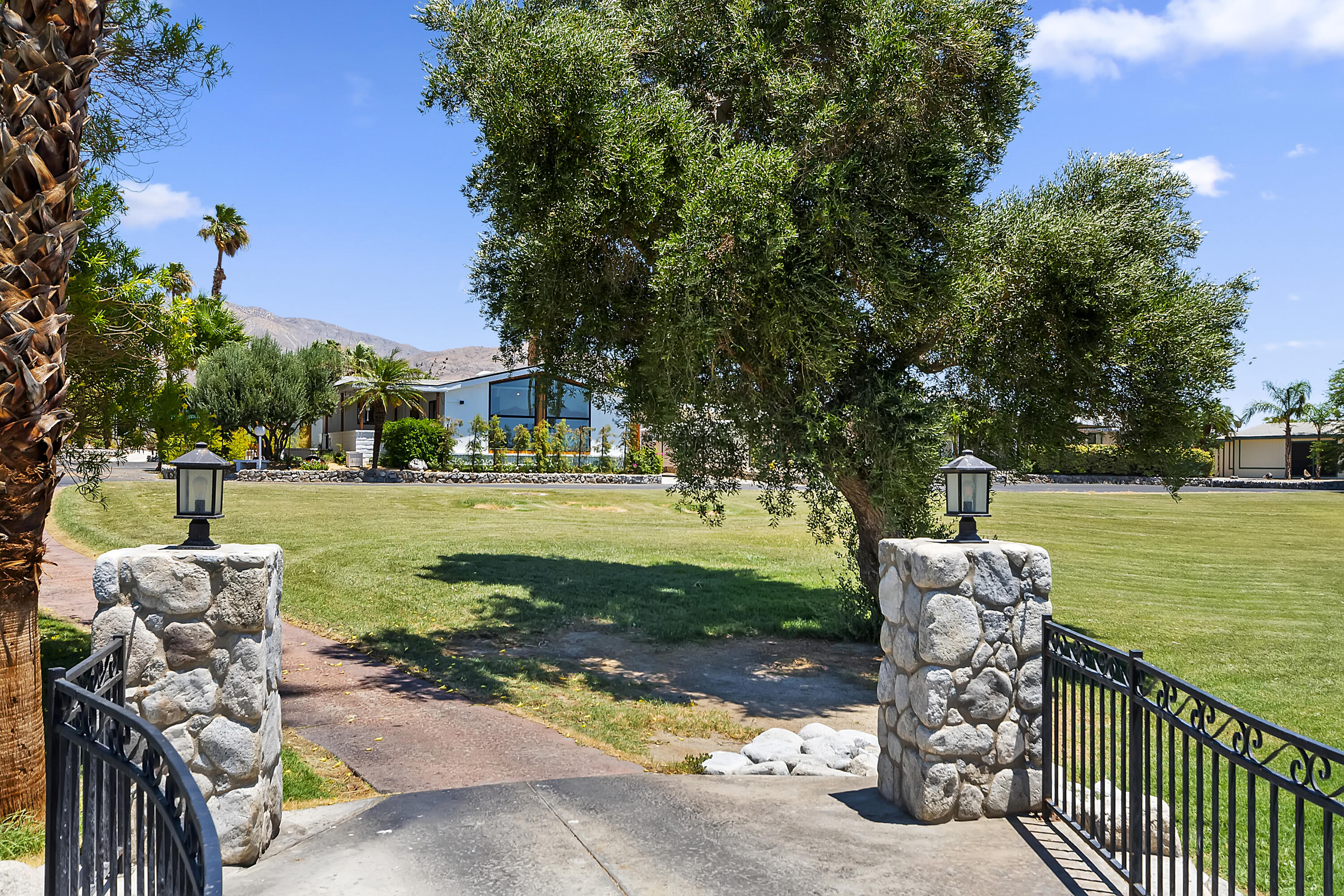 74711 Dillon Road, Unit 312 Desert Hot Springs, CA 92241 - Photo 47 of 49 a view of a park with large trees
