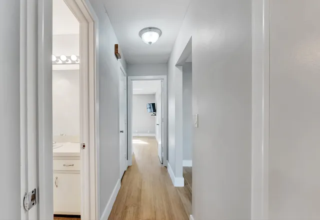 wooden floor in a hall with an entryway
